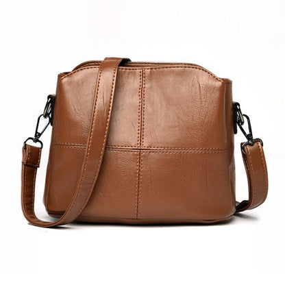 Damską modną skórzaną torebkę na ramię